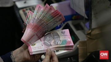 Nilai tukar rupiah berada di level Rp16.787 per dolar AS pada Jumat (27/2) sore usai melemah 28 poin atau 0,17 persen dari perdagangan sebelumnya. (Foto: CNN Indonesia/Adi Ibrahim)