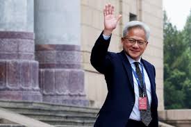 CHINA-US-DIPLOMACY     Nvidia founder and CEO Jensen Huang waves after a welcome ceremony for US President Donald Trump at the Great Hall of the People in Beijing on May 14, 2026. (Photo by Brendan SMIALOWSKI / AFP via Getty Images)