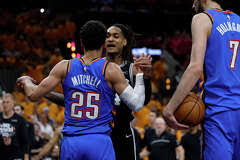 San Antonio Spurs guard Devin Vassell (24) confronts Oklahoma City Thunder guard Ajay Mitchell (25) after a flagrant foul on San Antonio Spurs guard Stephon Castle (5), not pictured, during the third quarter of Game 3 of the Western Conference Finals at Frost Bank Center in San Antonio, Friday, May 22, 2026.Sam Owens/San Antonio Express-News
